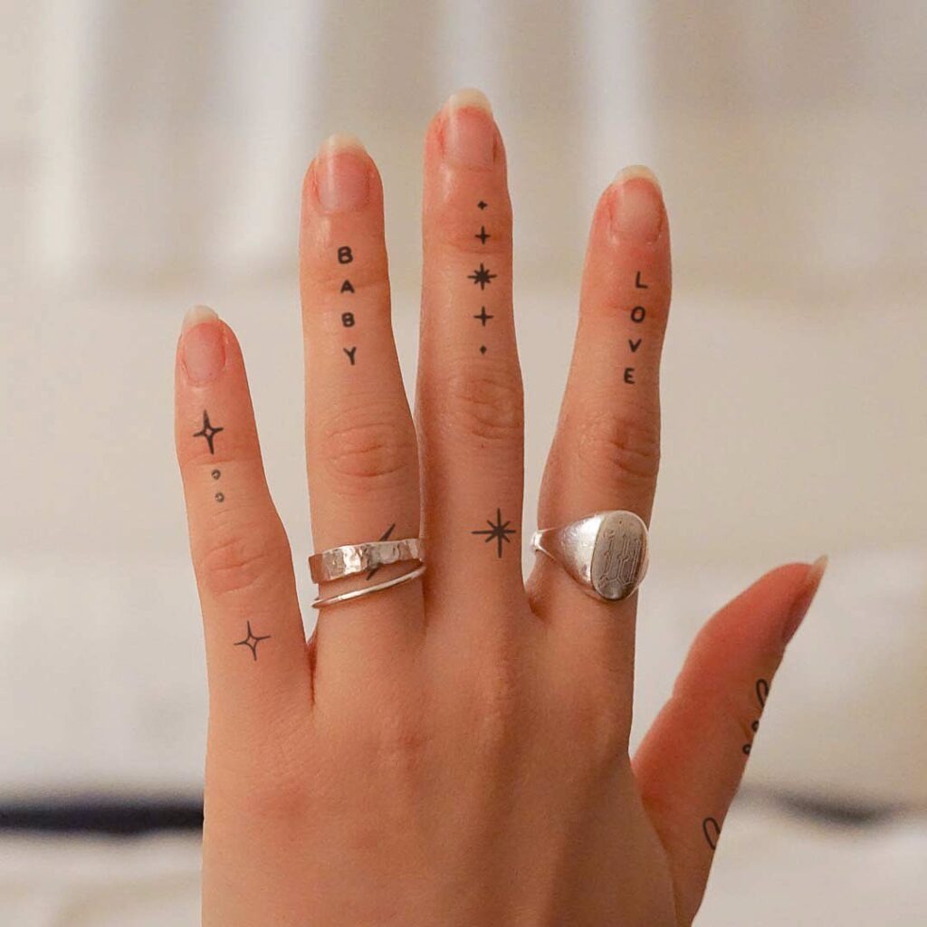 Baby and Love Finger Tattoos with Stars Tattoo Design