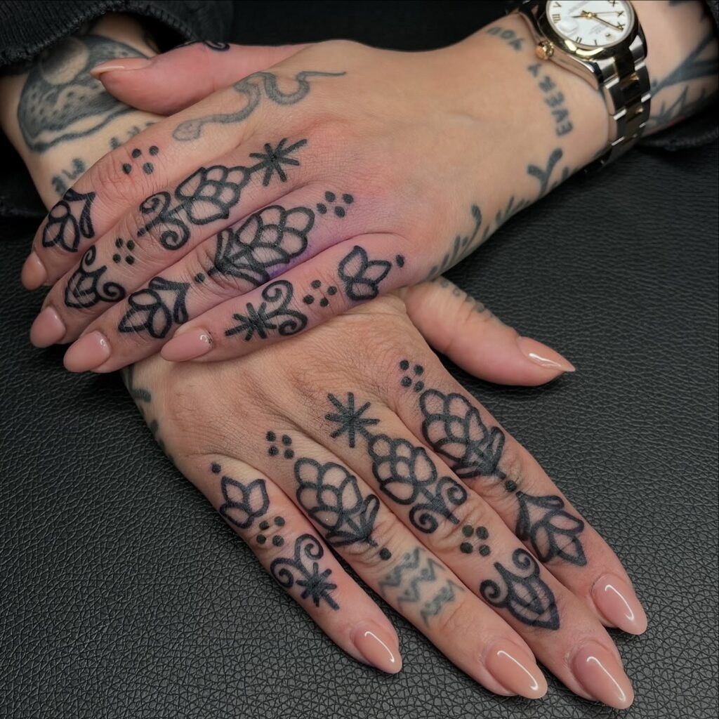 Bold Floral Finger Tattoos Tattoo Design