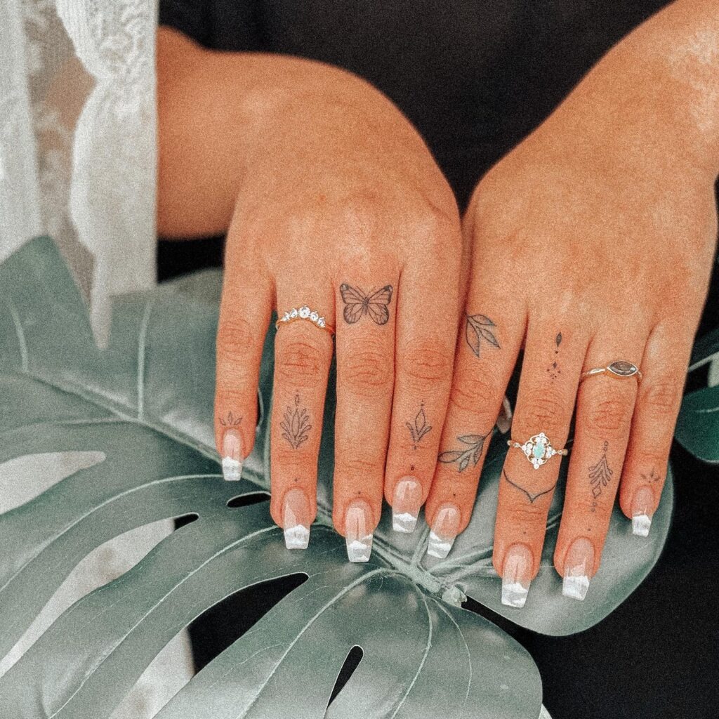 Butterfly and Leaf Finger Tattoos Tattoo Design