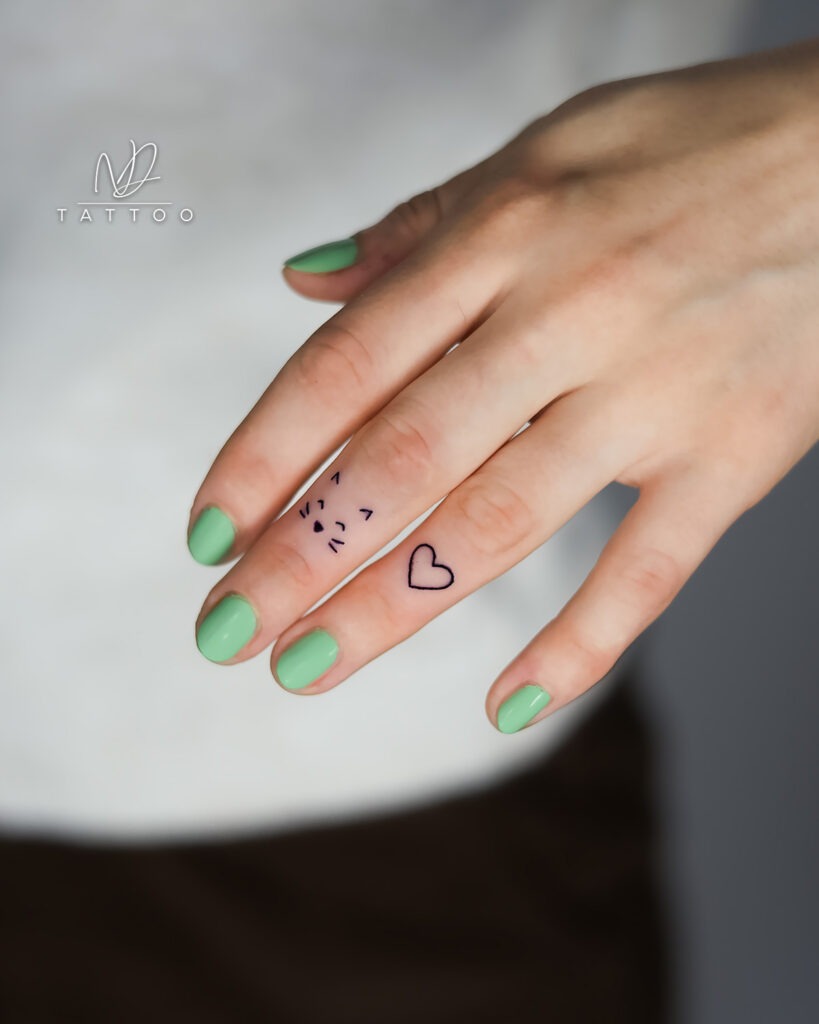 Cat Face and Heart Finger Tattoo Tattoo Design