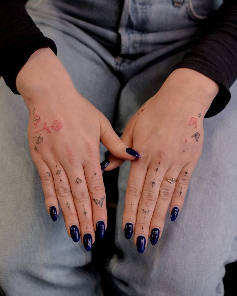 Celestial and Rose Finger Tattoos Tattoo Design