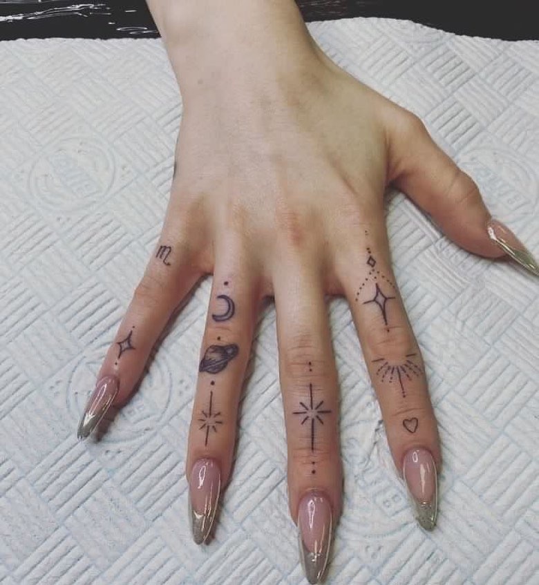 Celestial Finger Tattoos with Planets and Stars Tattoo Design