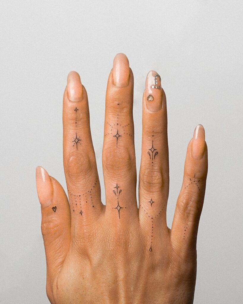Celestial Sparkle Finger Tattoos Tattoo Design