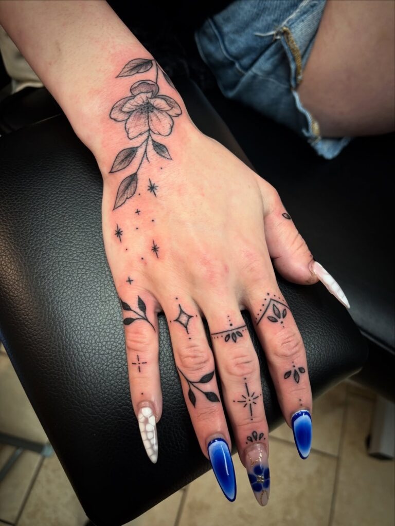 Floral and Star Finger Tattoos Tattoo Design