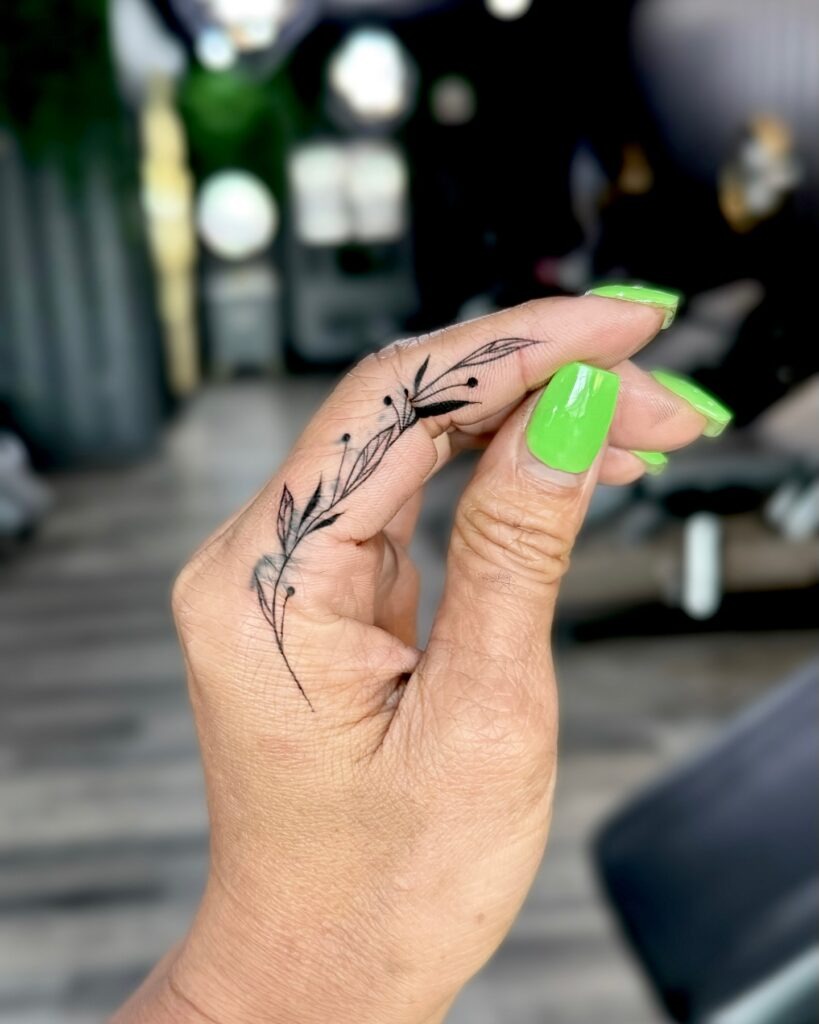 Flowing Leaf Finger Tattoo Tattoo Design