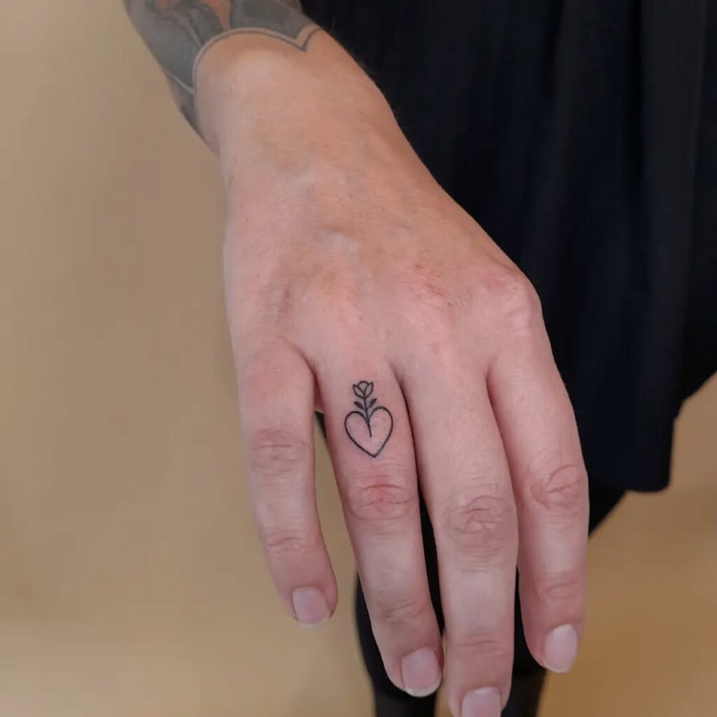 Heart with Tiny Flower Finger Tattoo Tattoo Design