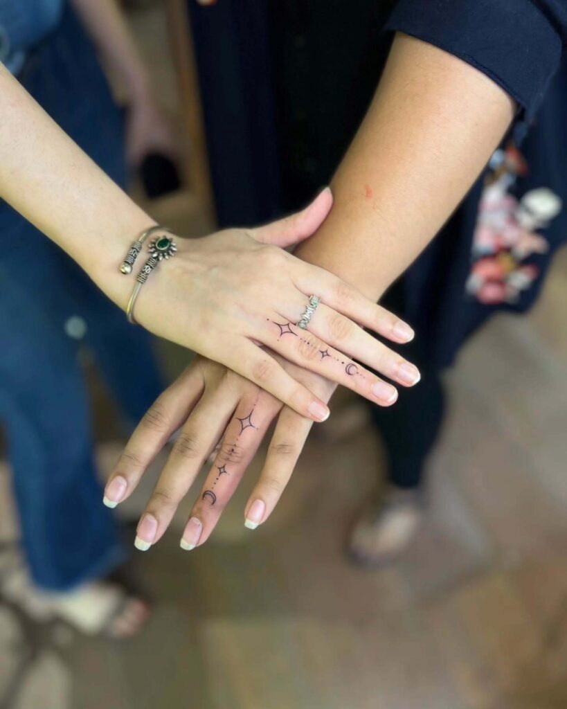 Matching Moon and Star Finger Tattoos Tattoo Design