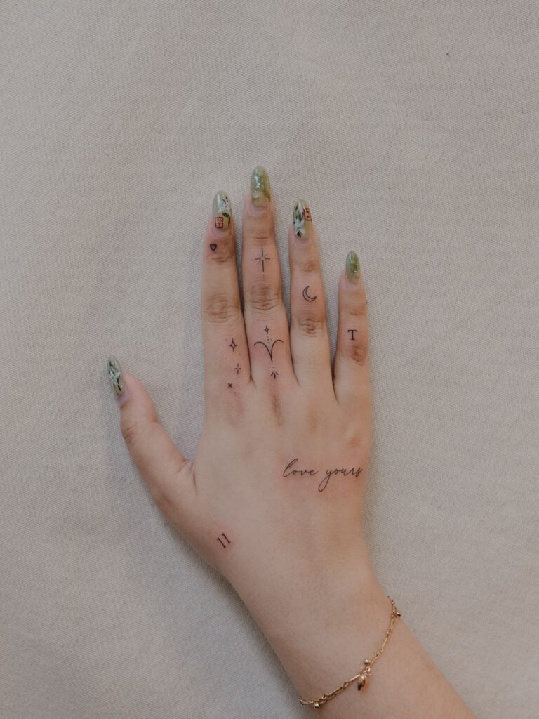Minimal Celestial and Letter Finger Tattoos Tattoo Design