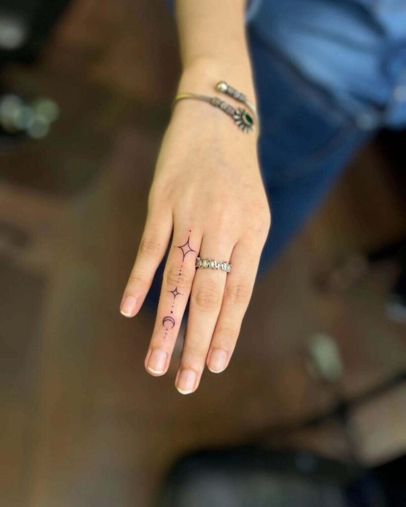 Moon and Star Finger Tattoo Tattoo Design