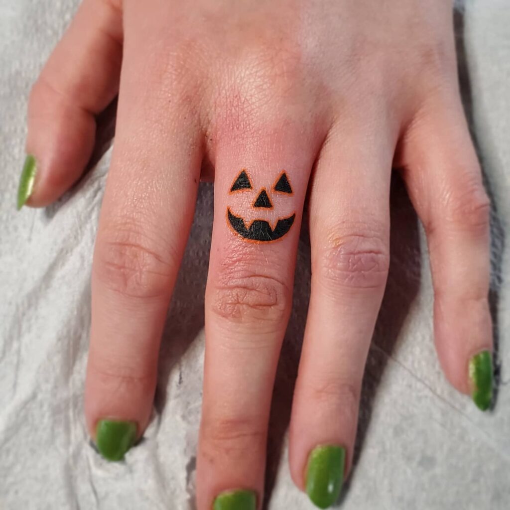 Pumpkin Face Finger Tattoo Tattoo Design