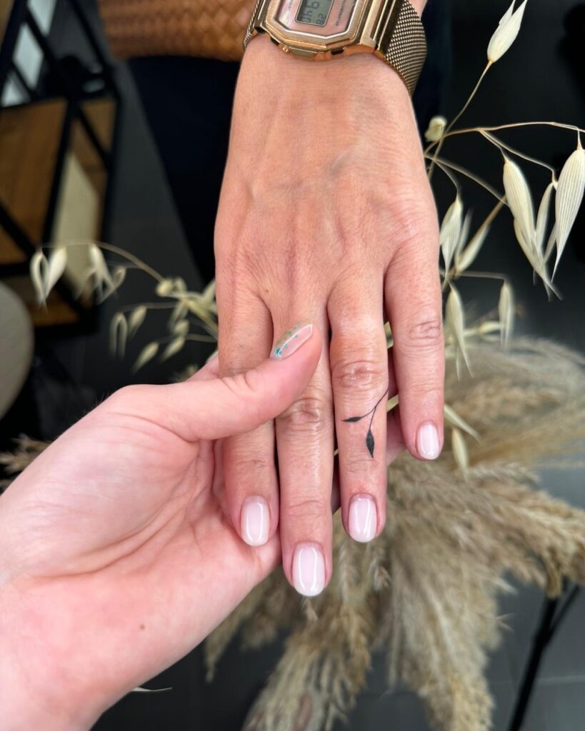 Simple Leaf Stem Finger Tattoo Tattoo Design
