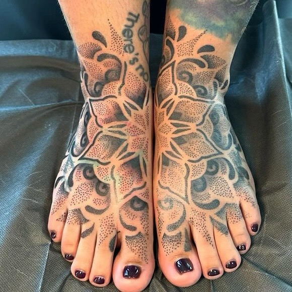 Bold Mandala-Inspired Ornamental Foot Tattoo Tattoo Design