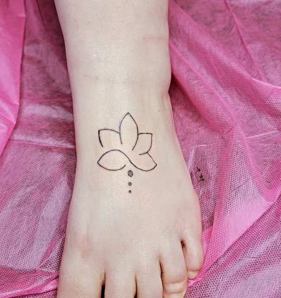 Ornamental Dotwork and Leaf Motif Foot Tattoo Tattoo Design