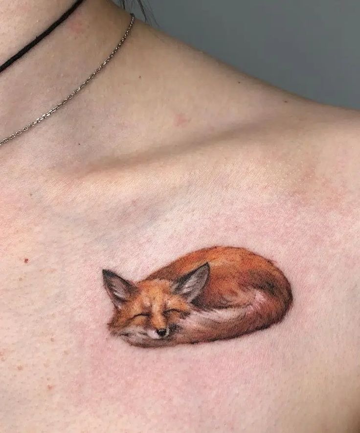 Soft Sleeping Fox on Collarbone Tattoo Design