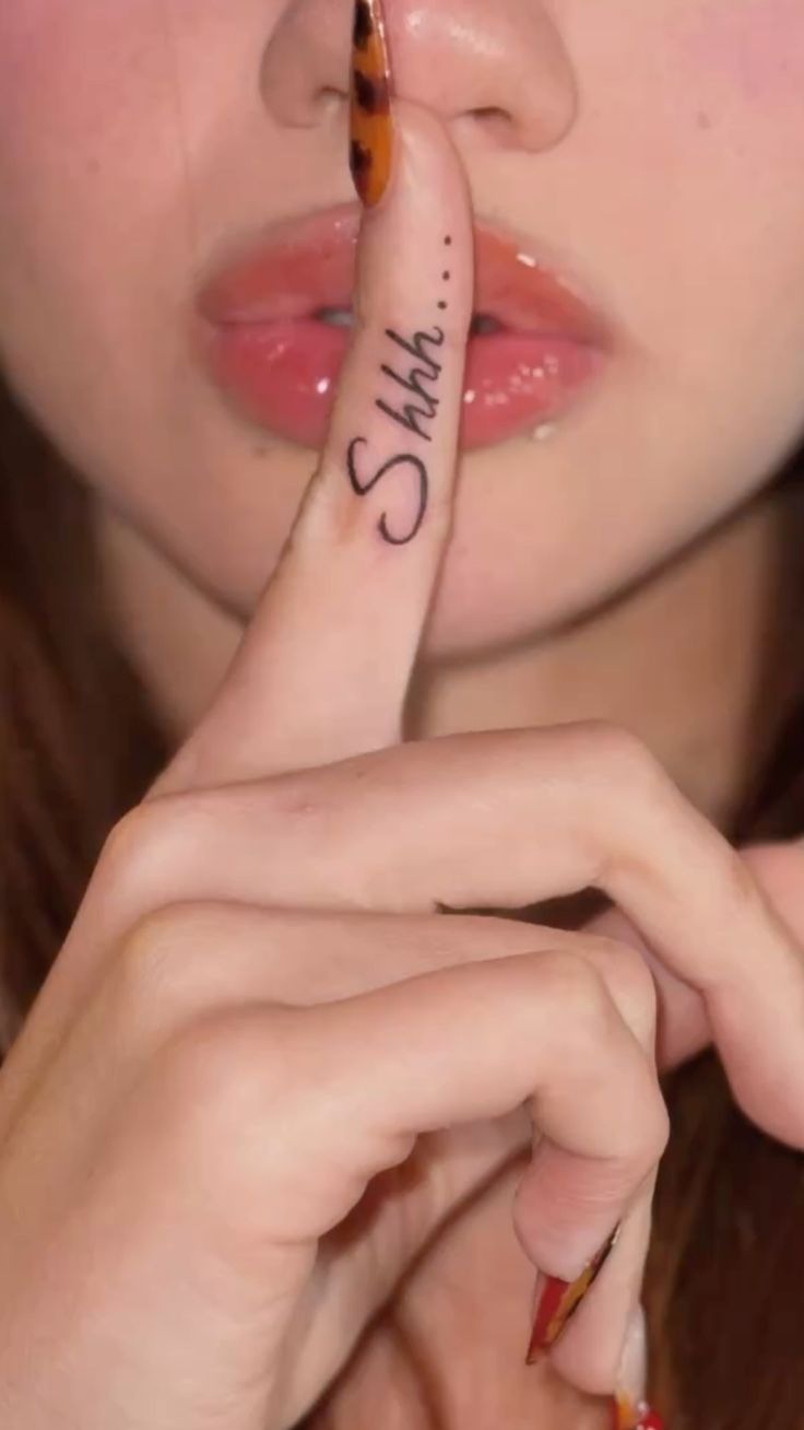 Tiny “Shh…” Finger Tattoo Tattoo Design