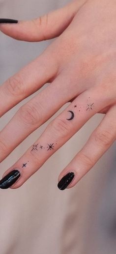 Tiny Star and Moon Finger Constellation Tattoo Design