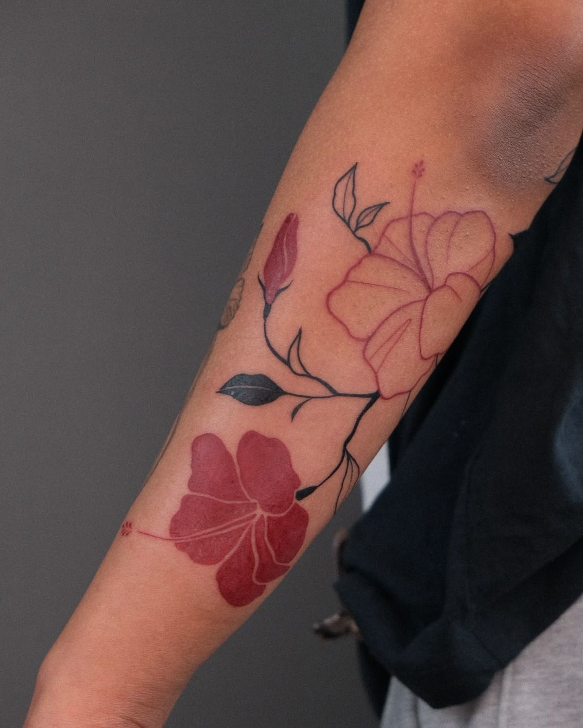 Small Hibiscus With Subtle Color Tattoo Design