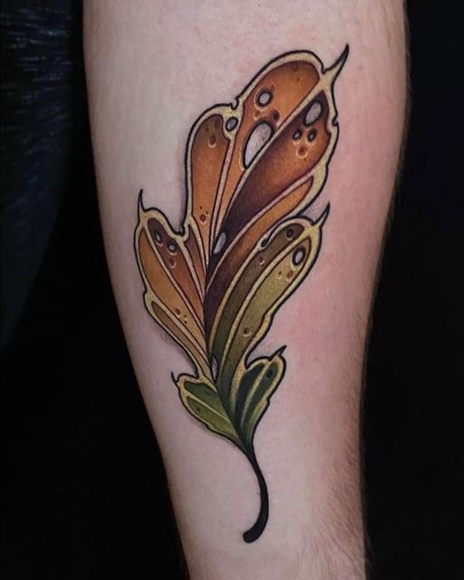 Stylized Leaf with Water Droplets Tattoo Design
