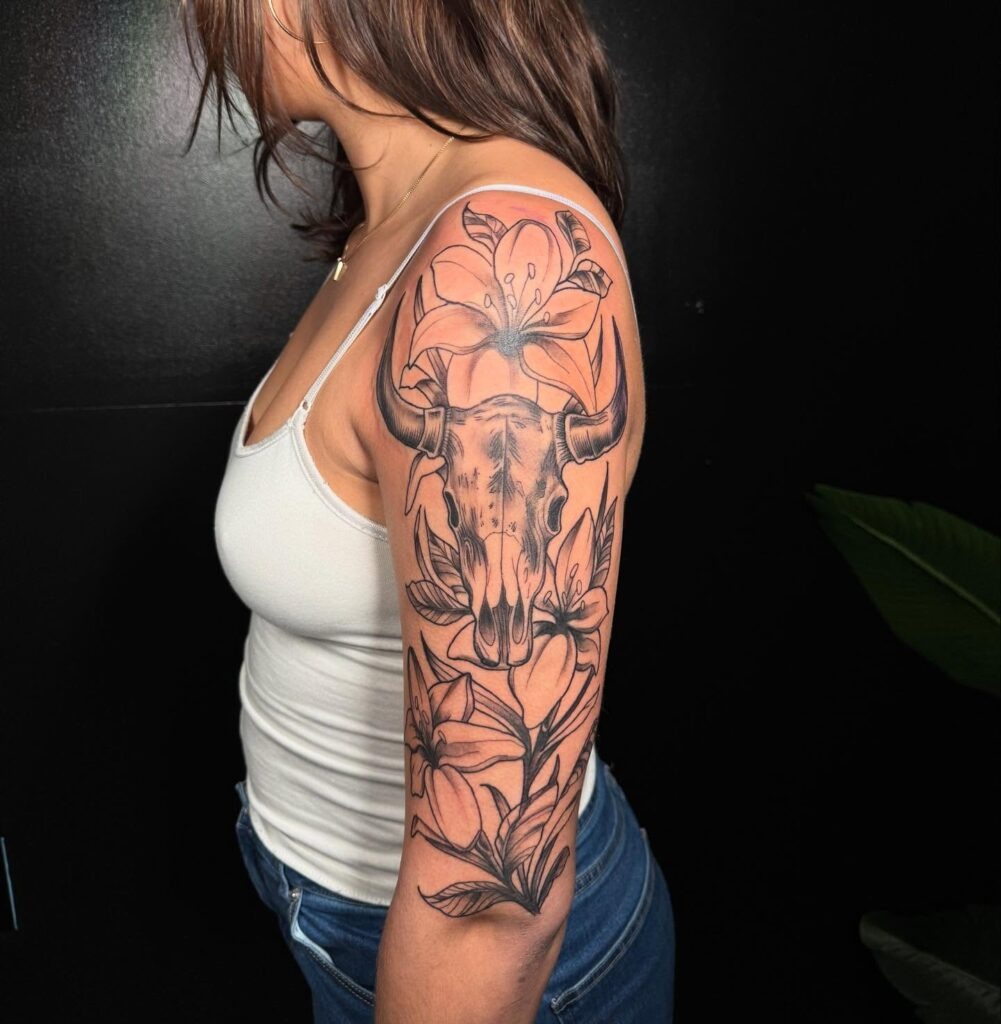 Bull Skull and Lilies Half Sleeve Tattoo Tattoo Design