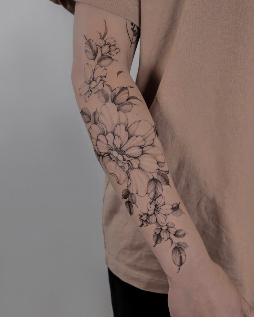 Delicate Floral Half Sleeve Tattoo with Fine Shading Tattoo Design