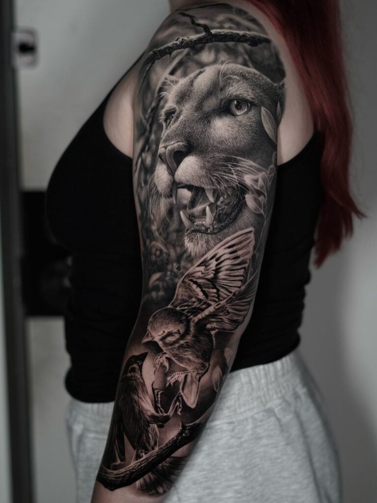 Lion and Birds Realistic Half Sleeve Tattoo Tattoo Design