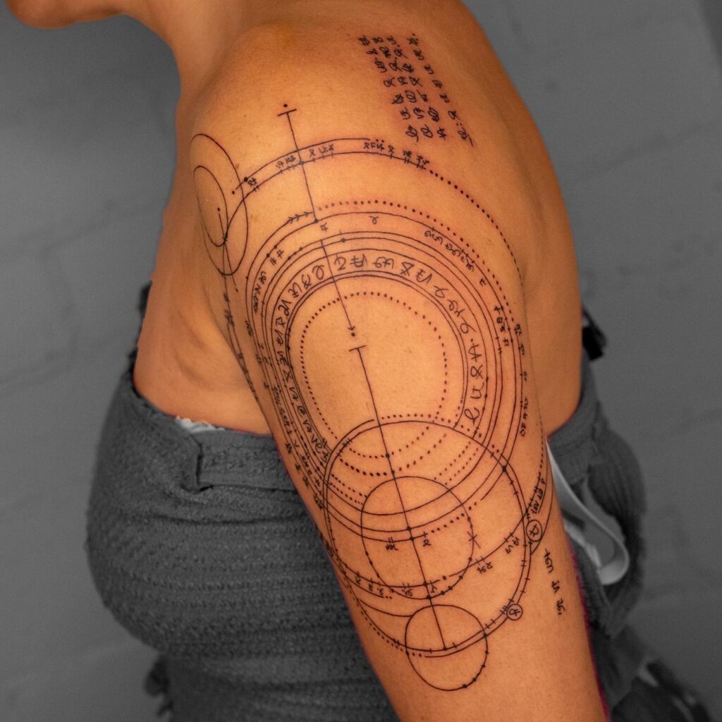 Spiritual Geometric Half Sleeve Tattoo with Sacred Symbols Tattoo Design