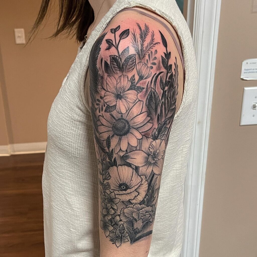 Wildflower Half Sleeve Tattoo with Dark Shading Tattoo Design