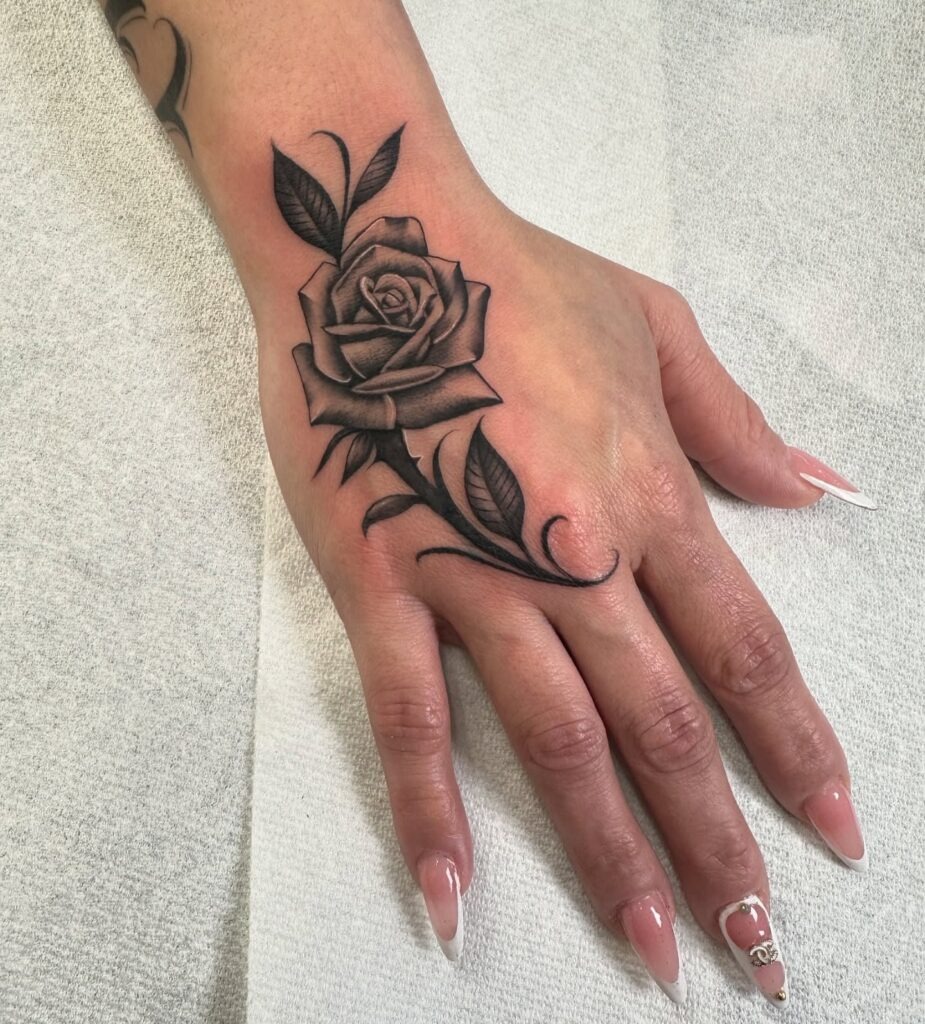 Abstract Flow and Symbolic Hand Tattoo Tattoo Design