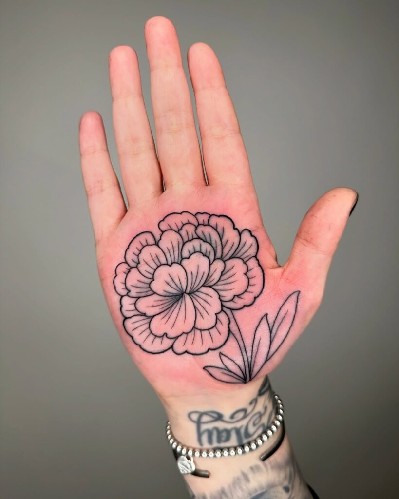 Elegant Peony and Lettering Hand Tattoo Tattoo Design