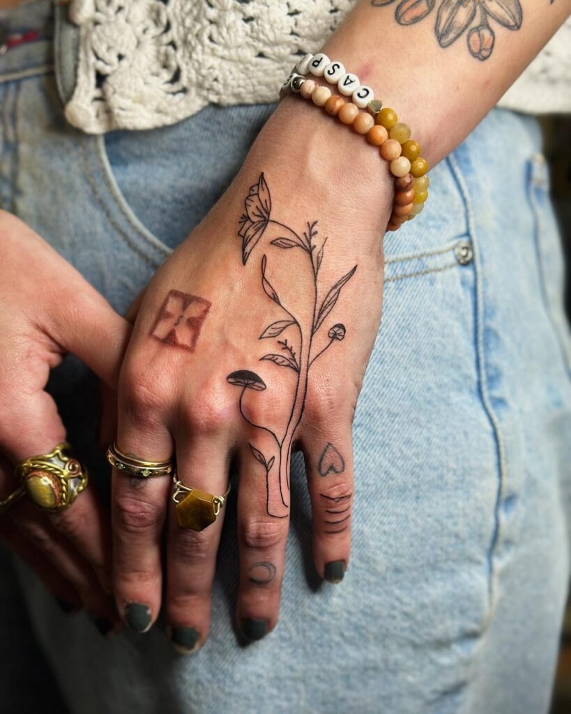 Elegant Rose Hand Tattoo Tattoo Design