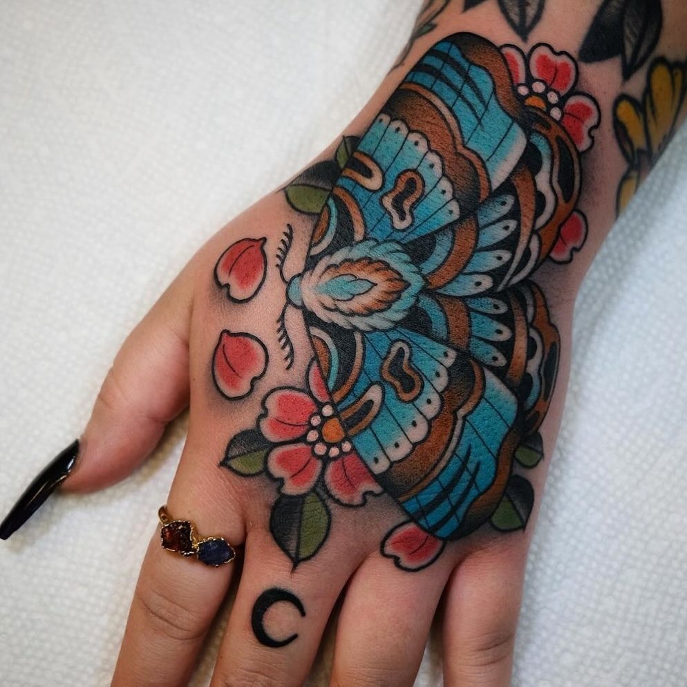 Floral Hand Tattoo with “Bella Ciao” Script Tattoo Design