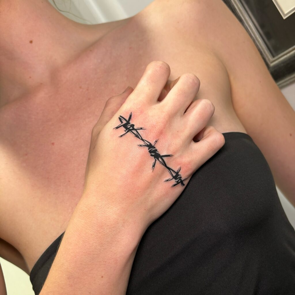 Minimalist Dotwork and Geometric Hand Tattoo Tattoo Design