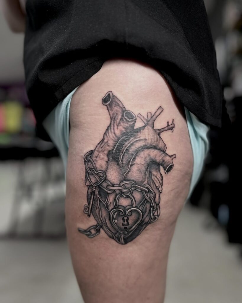 Heart with Lock and Chains Hip Tattoo Tattoo Design
