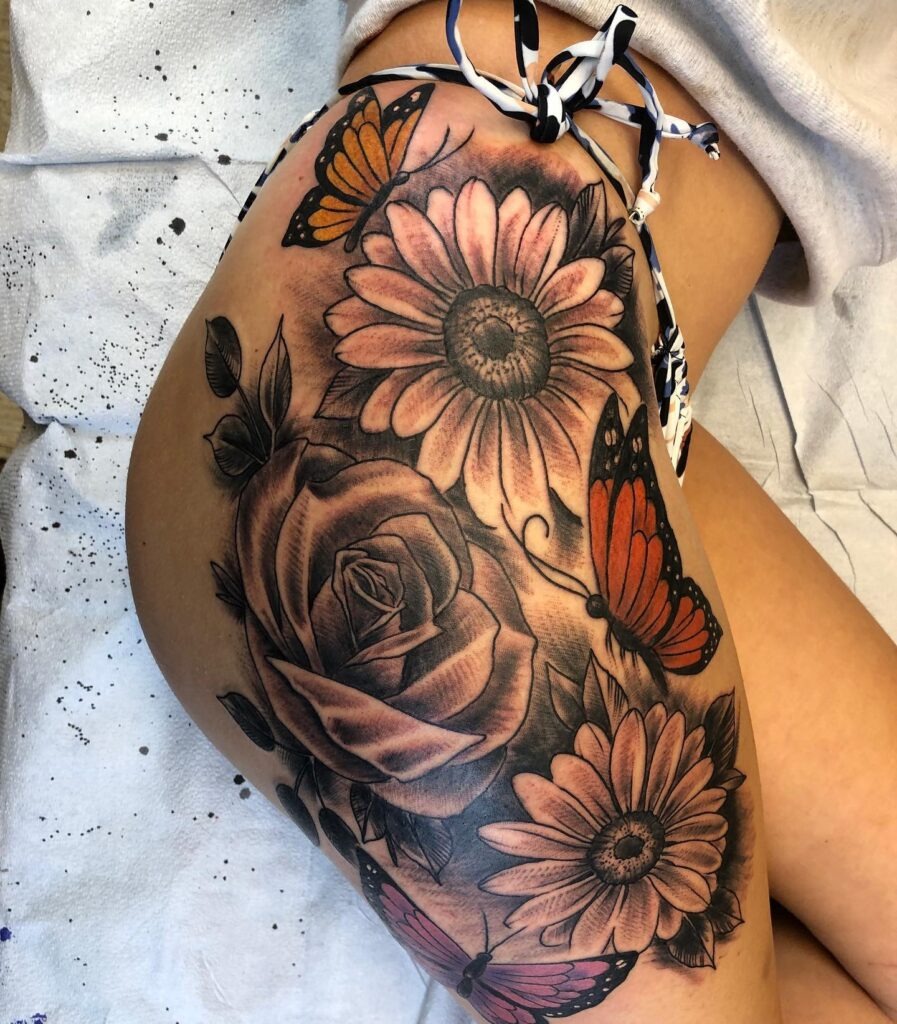 Rose, Daisy, and Butterfly Hip Tattoo Tattoo Design