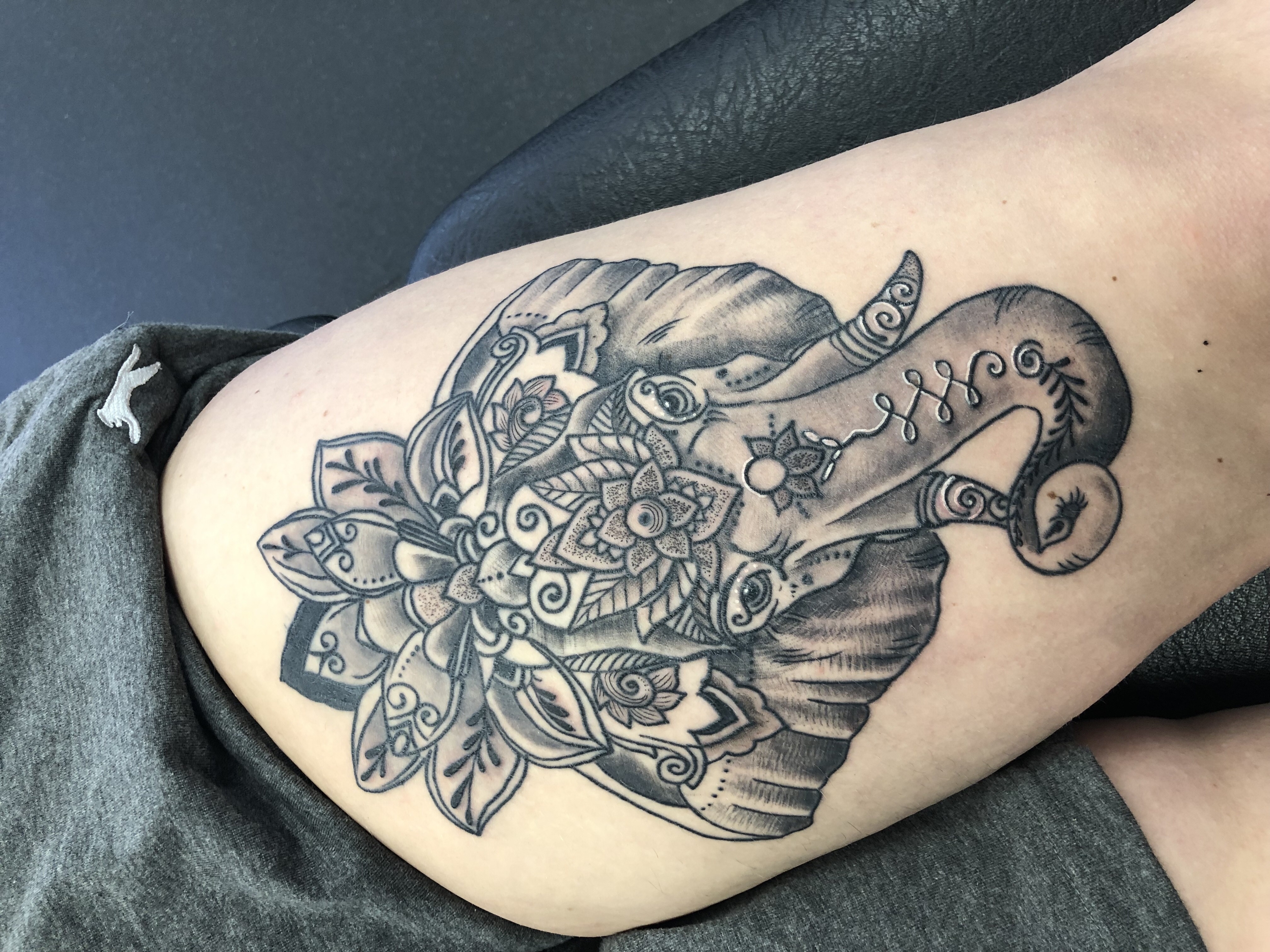 Majestic Lion & Flower Tattoo Design