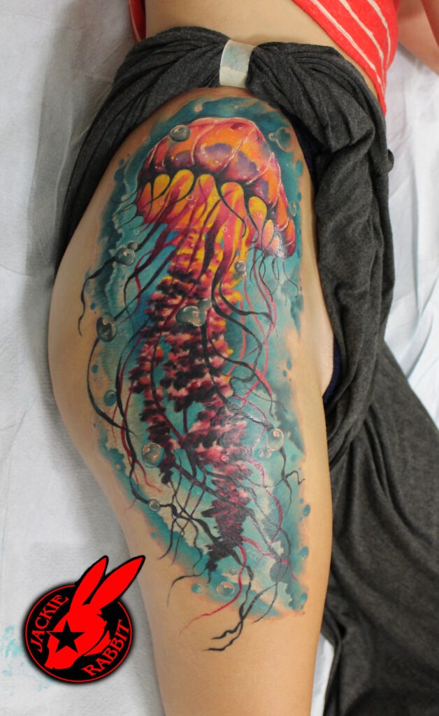 Ornate Skull and Scrollwork Thigh Tattoo Tattoo Design