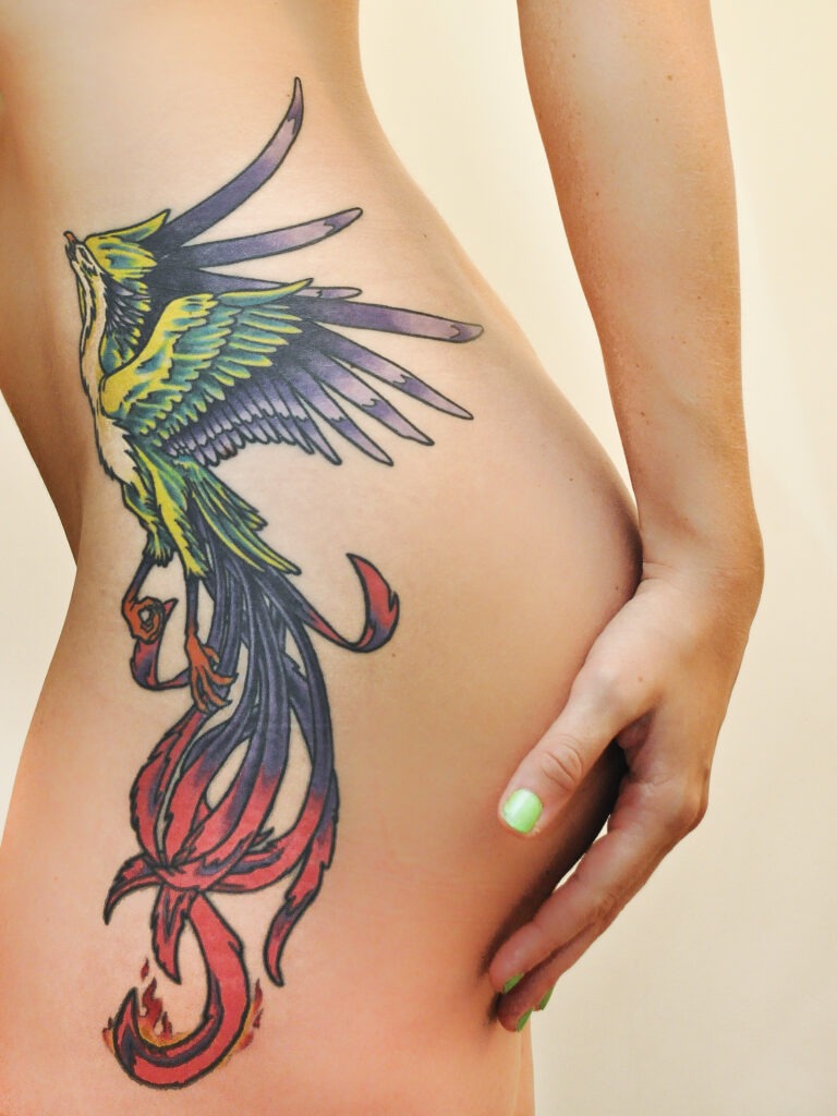 Skull and Floral Contrast Hip Tattoo Tattoo Design