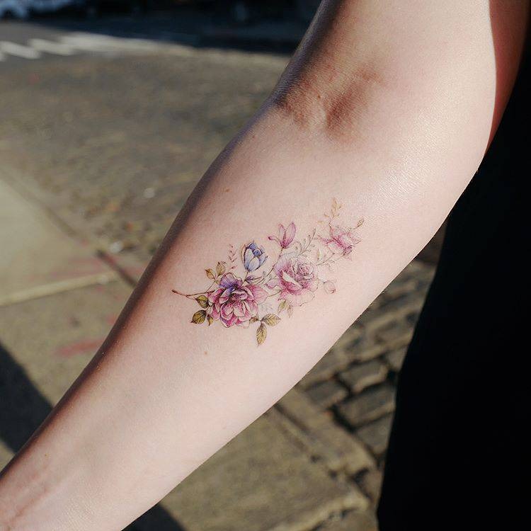 Delicate Floral Watercolor Tattoo Tattoo Design