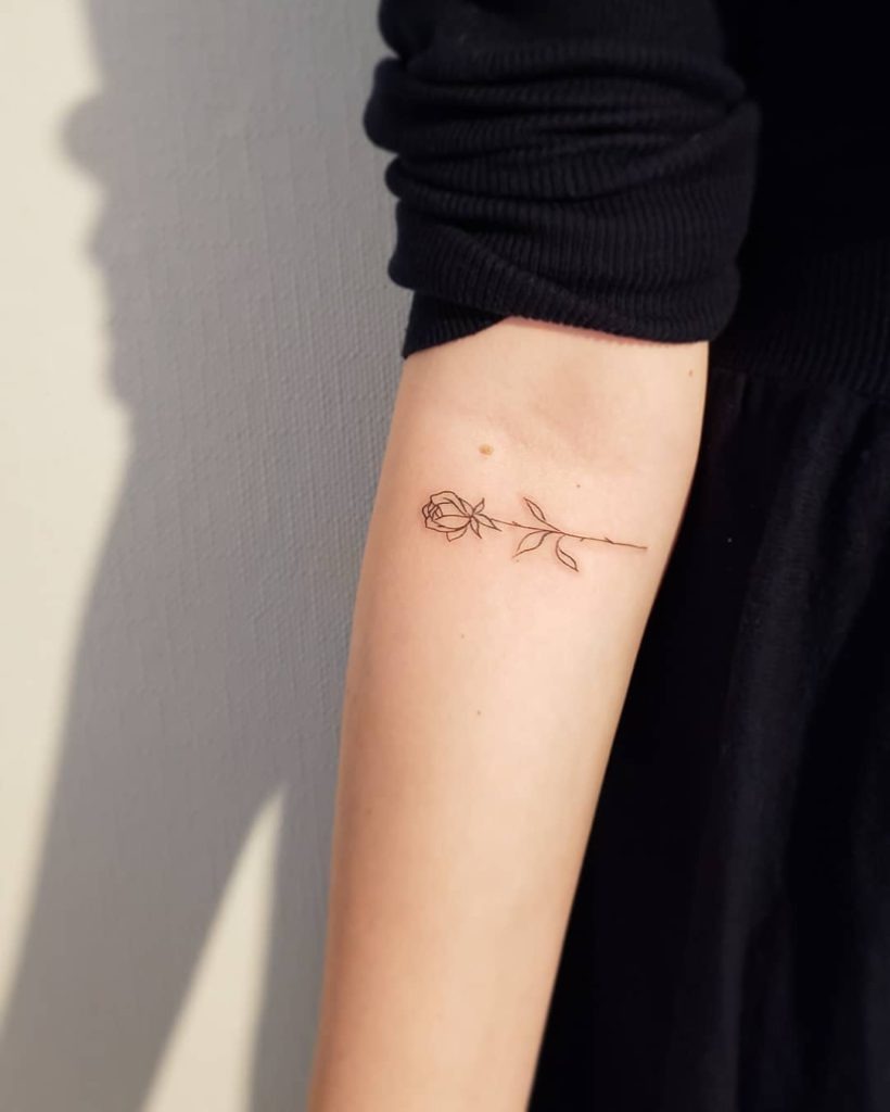 Minimalist Rose Outline Tattoo Design