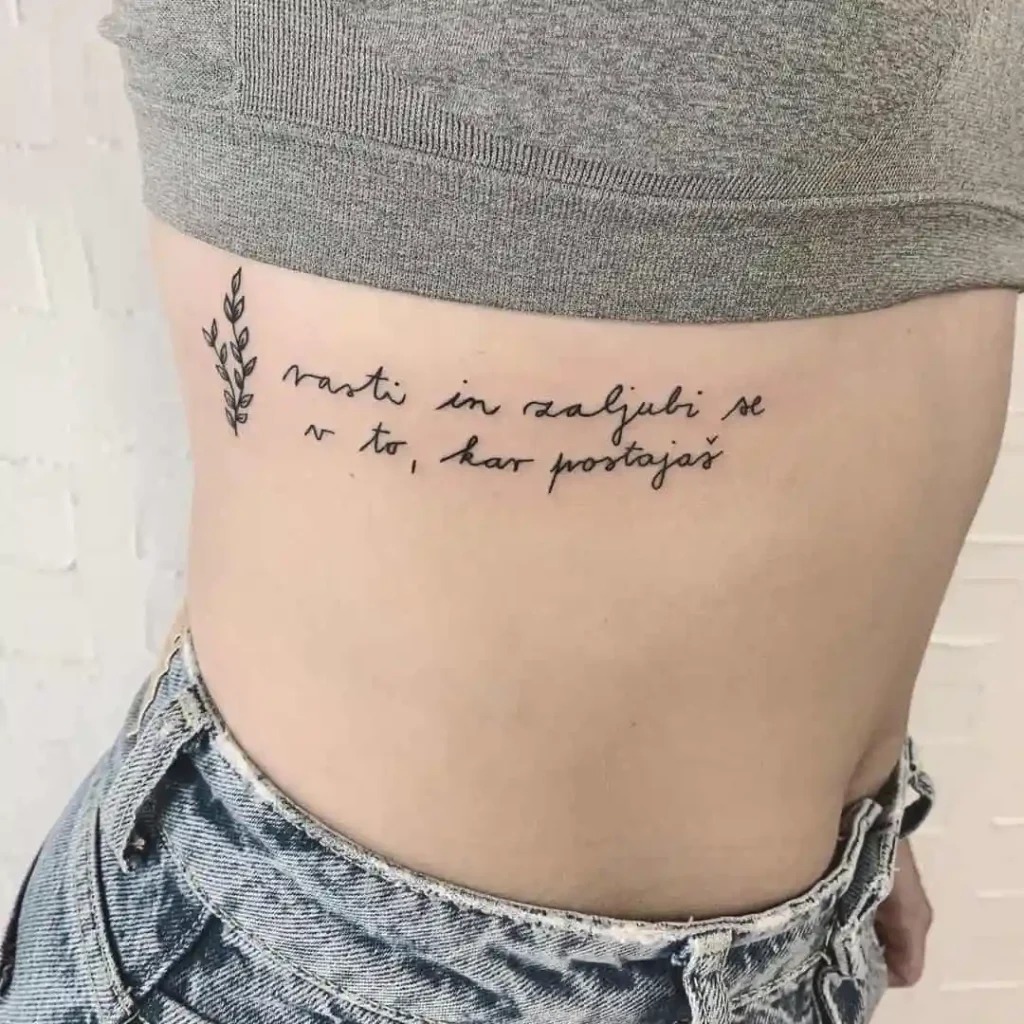 Ribcage Quote Tattoo with Leaves Tattoo Design
