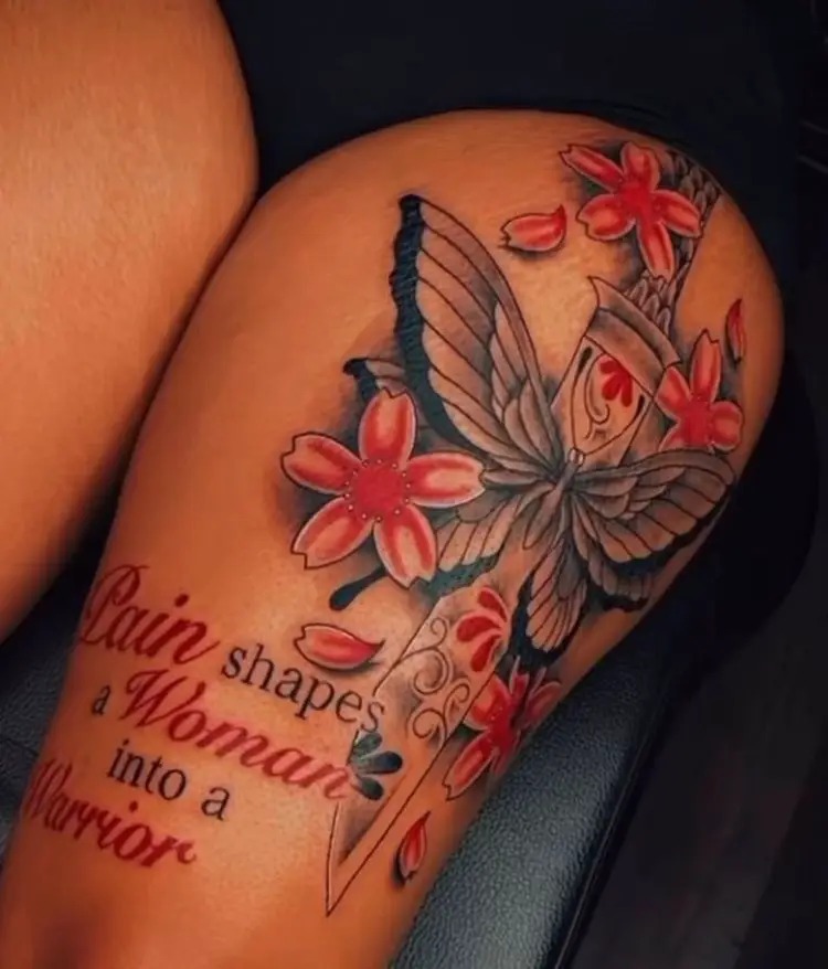 Butterfly, Sword, and Floral Thigh Tattoo with Quote Tattoo Design