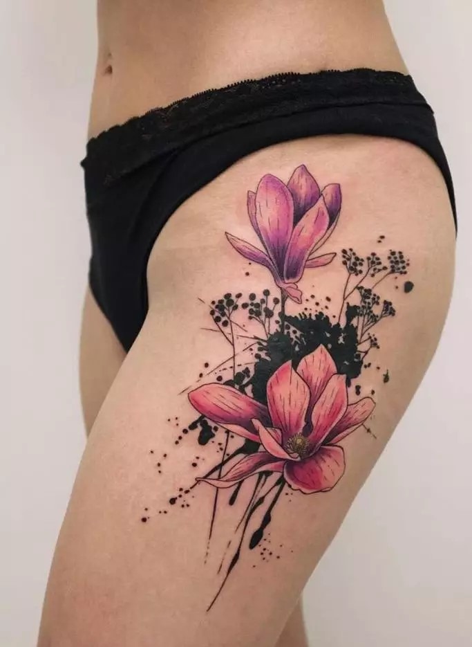 Colorful Floral Thigh Tattoo with Watercolor Effect Tattoo Design