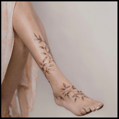 Wrap Around Leaf Design on Lower Leg Tattoo Design