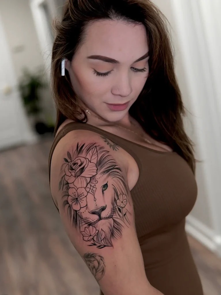 Bold Leo Tattoo with Floral and Tribal Elements Tattoo Design
