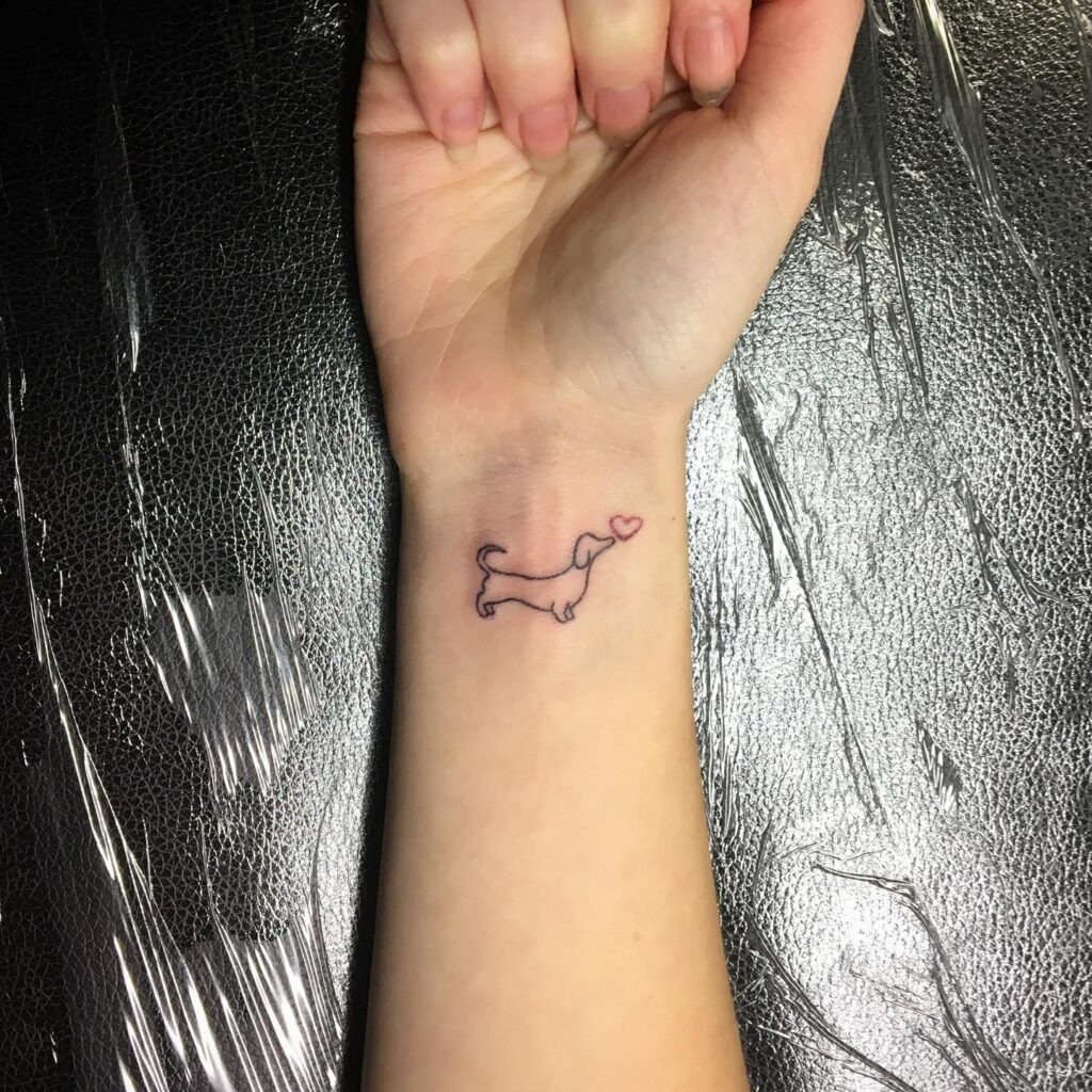 Minimal Dachshund Tattoo with Heart on Wrist Tattoo Design