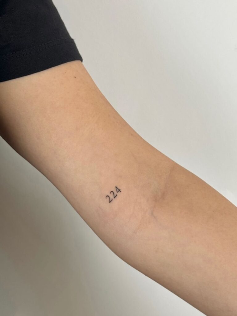 Minimal Number Tattoo “224” on Arm Tattoo Design