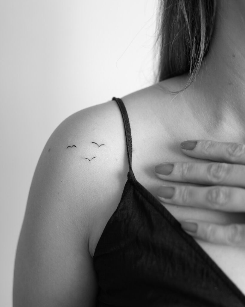 Minimalist Flying Birds Tattoo on Shoulder Tattoo Design