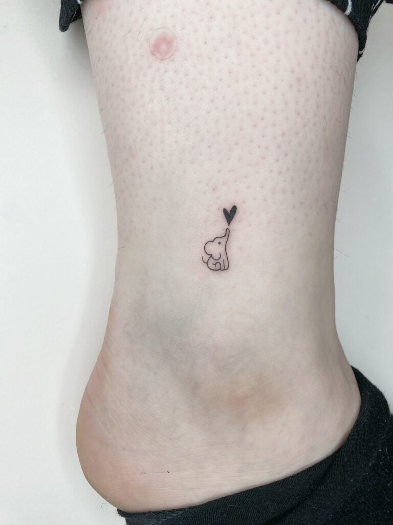 Tiny Elephant with Heart Tattoo Tattoo Design