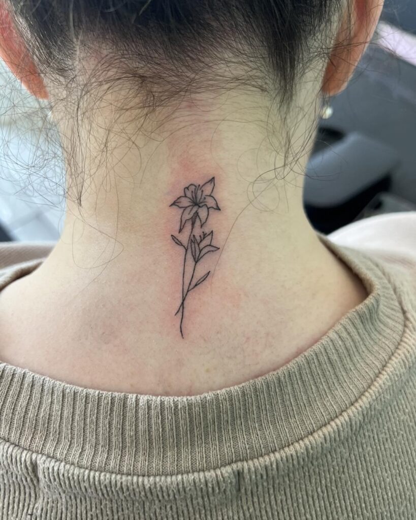 Delicate Wildflower Back of Neck Tattoo Tattoo Design