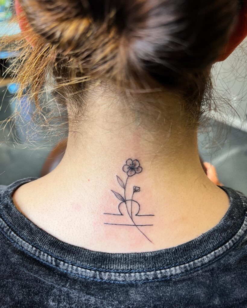 Simple Name Neck Tattoo in Cursive Tattoo Design